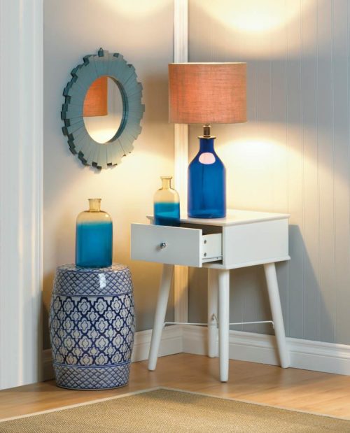 BLUE AND WHITE CERAMIC DECORATIVE STOOL, BLUE SUNBURST WALL MIRROR, MODERN CHIC SIDE TABLE